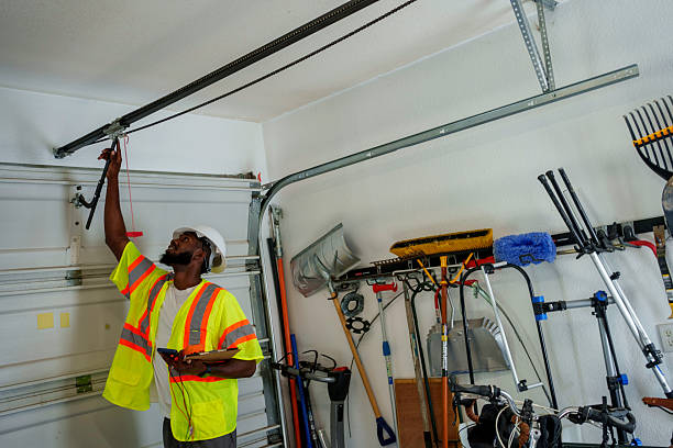 Professional Garage Door Panel Replacement technician working in Atkins, AR